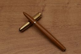 A rare Parker 51 Vacumatic fill fountain pen in Mustard with gold filled twin jewel converging lined