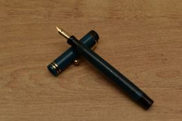A Parker Pastel Lucky Curve button fill fountain pen in Naples Blue with two gold an one black cap