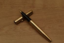 A Parker 65 converter fill fountain pen in Rolled Gold having Parker 14K 585 nib. Circa 1967