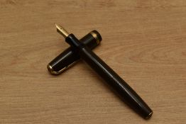 A Parker Duofold button fill fountain pen in Chocolate Brown with single broad cap band having