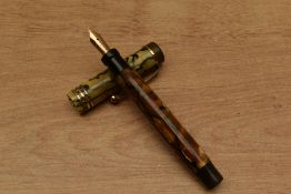 A Parker Duofold Junior button fill fountain pen in Pearl and Black with three bands to a Flat Top