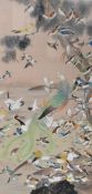 A 20th century Chinese inspired watercolour on silk, depicting a collection of vibrant birds, within