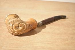 A white metal mounted Meerschaum pipe, having a carved country scene and scrollwork and white