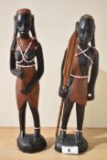 Two 20th-century African Tribal Art hand carved hardwood Maasai female and male warrior