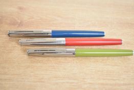 Three Platignum cartridge fill fountain pens in Green, Teal and Red with steel caps. (red has cracks