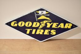 A diamond shaped Goodyear Tyres cast sign
