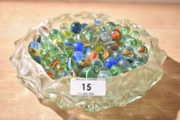 A large selection of 20th-century glass marbles, to feature a variety of styles and colour