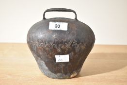 A 20th-century iron cow bell, having a bulbous shape and welded hook atop, unmarked, 15cm in height,