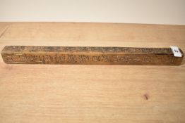 A 20th-century Chinese handcarved 'tianpeng ruler', having four-sides of carved Chinese characters