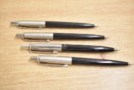 Four Parker Jotter ballpoint pens in black