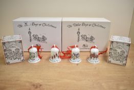 A set of twelve Hutschenreuther porcelain Twelve Days of Christmas bells in original boxes.