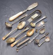 A group of three 19th century French silver teaspoons, along with an assortment of silver