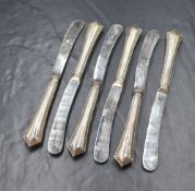 A cased set of George V silver handled dessert knives, marks for Sheffield 1921, maker James