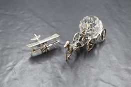 An Italian novelty silver plane study ornament, having a spinning propeller marked 925, along with