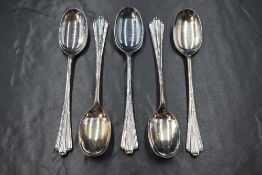 A cased group of five Edwardian silver Albany style teaspoons, marks for Sheffield 1904, maker