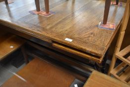 An early 20th Century oak drawer leaf dining table on interesting twist turned base, approx. 114 x