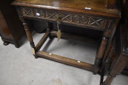 A 19th Century oak side table having frieze drawer, turned frame , dimensions approx. width 82 depth
