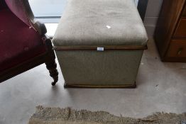 A Victorian and later ottoman stool having mahogany edging and dralon upholstery, approx