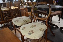 A pair of Victorian stained frame balloon back bedroom chairs