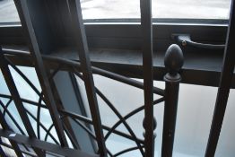A modern metal bed frame, double (4ft 6in)