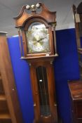 A modern mahogany long cased clock , the brass and moonphase dial named for James Stewart,Armagh