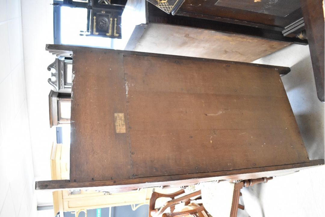 A Victorian oak bookcase in the Gothic style, labelled to reverse for Christopher Pratt & Sons, - Image 8 of 9