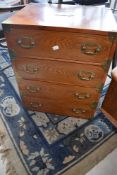 A modern/vintage hardwood chest of four drawers in the campaign style, dimensions approx. Height