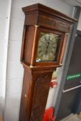 A late 18th Century and later oak long cased clock, having 30hr movement with faux winding holes,