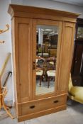 A Victorian reclaimed style pine mirror door wardrobe having drawer to base , height approx. 197