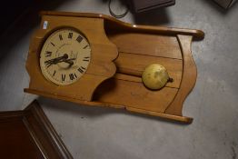 A pine cased Gledhill Brook time recorder clock