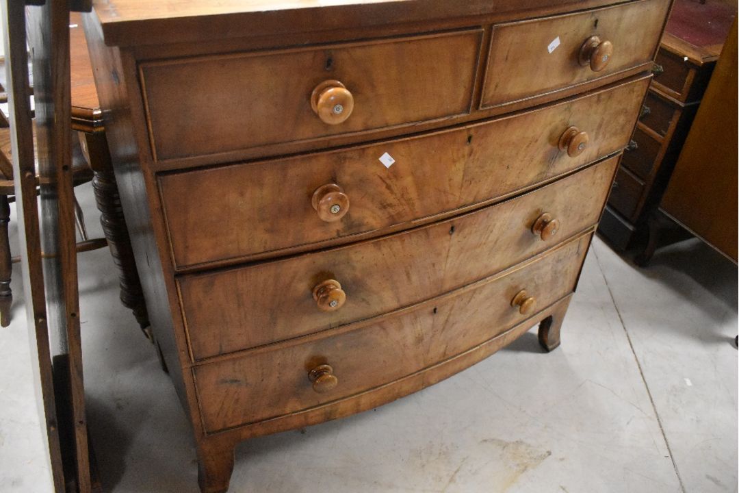 A Victorian mahogany bow fronted chest of two over three drawers, approx. Width 106 depth 50 - Image 1 of 3