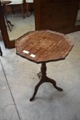 A reproduction mahogany wine table, diameter approx. 35cm, height 53cm