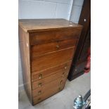 An early to mid 20th Century oak bureau/drawers, having lift lid (hinge loose) drop flap desk