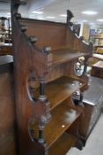 A Victorian oak bookcase in the Gothic style, labelled to reverse for Christopher Pratt & Sons,