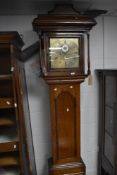 An 18th Century and later oak long cased clock having 8 day movement with brass dial named for