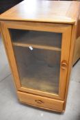 A modern Ercol hifi cabinet , width drawer to base, dimensions approx. height 99, width 49, depth