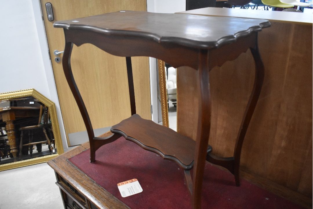 A Victorian mahogany occasional table having shaped top and undertier, approx. 72 x 40cm - Image 1 of 2