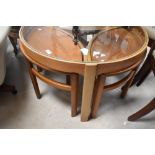 A vintage mid century (1960s Danish style) teak Nathan Trinity circular glass coffee table nest of