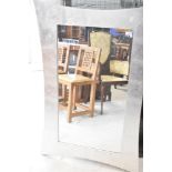 A modern wall mirror having silver coloured frosted/crackle effect frame, approx. 78 x 118cm