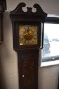 An 18th Century and later oak long cased clock , having heavily carved case with Red Lion (tavern)