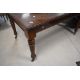 A late Victorian mahogany extending dining table, of rectangular form with moulded edge detail and - Image 1 of 3