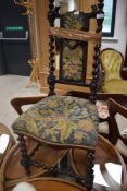 A Victorian bedroom chair having twist frame with tapestry seat and back (af)