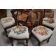 A set of four Victorian mahogany balloon back dining chairs having later tapestry foliate decoration - Image 1 of 4