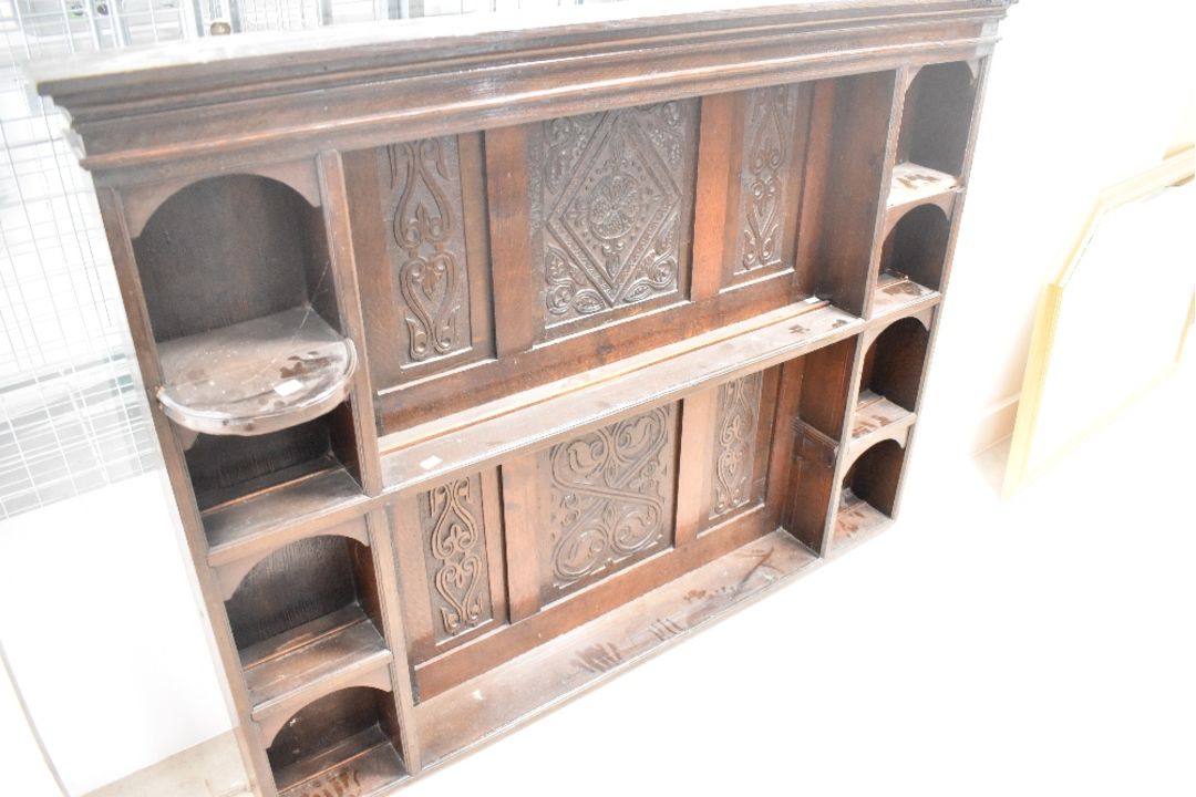 A period oak dresser back having carved decoration to panels, some damage to shelves. Width - Image 1 of 3