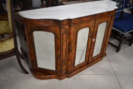 A Victorian walnut credenza having marble top and mirrored doors, width approx. 152cm