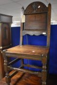 A late 18th/early 19th Century solid seat dining chair on turned frame