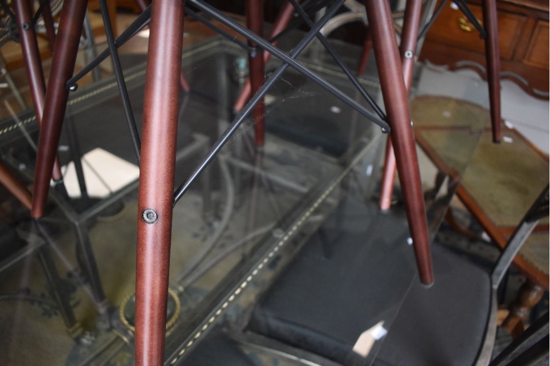 A pair of modern designer chairs, by Vitra after Eames, having dark maple legs, in ocean and oxide - Image 3 of 3