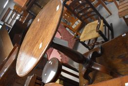 A Victorian mahogany occasional pedestal table, possibly a marriage , the circular top being