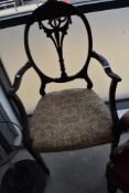 An early 20th Century stained frame carver chair