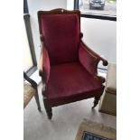 A Victorian mahogany scroll armchair , having later burgundy upholstery